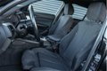 BMW 1-serie - 118i M Sport Cruise Control Navigatie Climate Control Parkeersensoren achter Licht met - 1 - Thumbnail