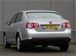 Volkswagen Jetta - 1.9 TDI Comfortline Business KEURIGE AUTO NAVIGATIE (bj2008) - 1 - Thumbnail