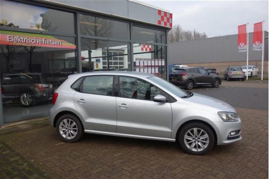 Volkswagen Polo - 1.2 TSI Comfortline Business R, PDC Voor en achter - 1