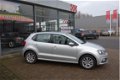 Volkswagen Polo - 1.2 TSI Comfortline Business R, PDC Voor en achter - 1 - Thumbnail