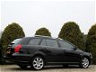 Toyota Avensis Wagon - 2.0 VVTi Executive Automaat / Leder - 1 - Thumbnail