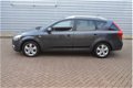 Kia Cee'd - 1.4 CVVT X-ecutive O.a.: Trekhaak, Navi, Roofrails, 16 inch L.m., - 1 - Thumbnail