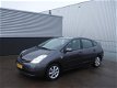 Toyota Prius - 1.5 Hybrid Comfort - 1 - Thumbnail