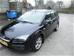 Ford Focus Wagon - 1.8-16V Ambiente Flexifuel Airco, Cruise control, Navigatie - 1 - Thumbnail