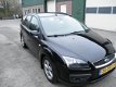 Ford Focus Wagon - 1.8-16V Ambiente Flexifuel Airco, Cruise control, Navigatie - 1 - Thumbnail