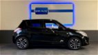 Suzuki Swift - 1.2 Extra airco navi leder/alcantara pdc standkachel - 1 - Thumbnail