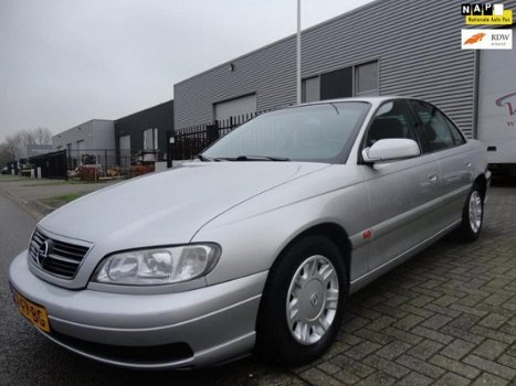 Opel Omega - 2.2i-16V 4 deurs, mooie auto, loopt als een zonnetje en rijd nog als een trein - 1