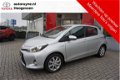 Toyota Yaris - 1.5 Full Hybrid Aspiration Navigatie, Smart key, Lichtmetaal - 1 - Thumbnail
