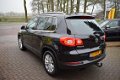 Volkswagen Tiguan - 1.4 TSI Sport&Style 4Motion AIRCO/CRUISE/DAK/PDC/TREKHAAK/NETTE STAAT - 1 - Thumbnail