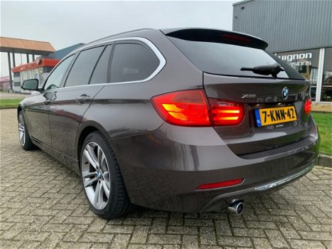 BMW 3-serie Touring - 320d xDrive High Executive Automaat , Trekhaak, Head-Up, ZEER COMPLEET - 1