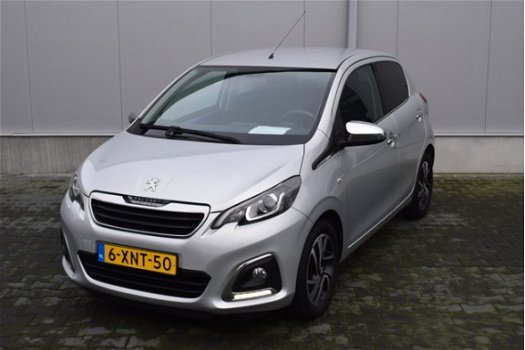 Peugeot 108 - 1.0 e-VTi Première luxe uitvoering met NAP - 1