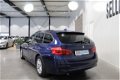 BMW 3-serie Touring - 318i Centennial High Executive | Navigatie | Stoelverwarming | LM Velgen | - 1 - Thumbnail