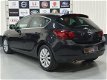 Opel Astra - 1.6 Turbo Cosmo -180PK-Airco-Navi-Pdc-Cruise-Xenon-2011 - 1 - Thumbnail