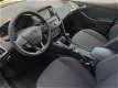 Ford Focus Wagon - 1.0 EcoBoost 100PK Titanium | Voorruitverwarming | Navigatie | Parkeer Assistent - 1 - Thumbnail