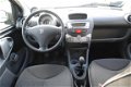 Peugeot 107 - 1.0-12V XS 5-DRS AIRCO NL-AUTO - 1 - Thumbnail