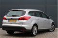 Ford Focus Wagon - 1.0 100pk Titanium | Dealer onderhouden | Climate control | Navigatie | Cruise co - 1 - Thumbnail