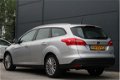 Ford Focus Wagon - 1.0 100pk Titanium | Dealer onderhouden | Climate control | Navigatie | Cruise co - 1 - Thumbnail