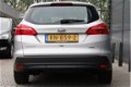 Ford Focus Wagon - 1.0 100pk Titanium | Dealer onderhouden | Climate control | Navigatie | Cruise co - 1 - Thumbnail