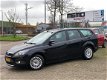 Ford Focus Wagon - 1.6 TDCi Titanium *NAVI*CLIMA*NAP*VOL - 1 - Thumbnail