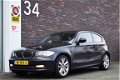 BMW 1-serie - 116d AIRCO LM VELGEN CD CV+AB EL RAMEN - 1 - Thumbnail