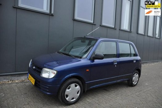 Daihatsu Cuore - 1.0-12V XTi NIEUWE APK 1.0 - 1