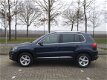 Volkswagen Tiguan - 1.4 TSI 160pk Sport&Style Climate control / Navigatie / Park assist / Trekhaak - 1 - Thumbnail