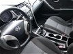 Hyundai i30 - 1.4i i-Drive Cool 6/12 M Garantie - 1 - Thumbnail