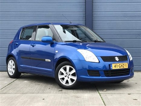 Suzuki Swift - 1.3 Comfort / 5 DEURS / AIRCO / TREKHAAK - 1