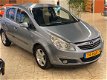 Opel Corsa - 1.2-16V Enjoy Automaat - 1 - Thumbnail