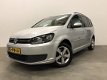 Volkswagen Touran - 1.4 TSI 140pk 7-Pers. 101DKM/ECC/16INCH/PRIVACY/PDC/NWSTAAT - 1 - Thumbnail