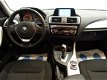 BMW 1-serie - 116D High Executive Aut8, Full map Navi, Xenon, ECC, LMV, Nw model - 1 - Thumbnail