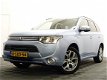 Mitsubishi Outlander - 2.0 PHEV Instyle Plus 4WD Aut, Schuifdak, Leer, Navi, camera, Full - 1 - Thumbnail