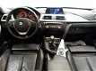 BMW 3-serie - 320i Sedan 170pk High Executive M Vol Leer, Navi, Xenon, PDC, ECC, LMV - 1 - Thumbnail