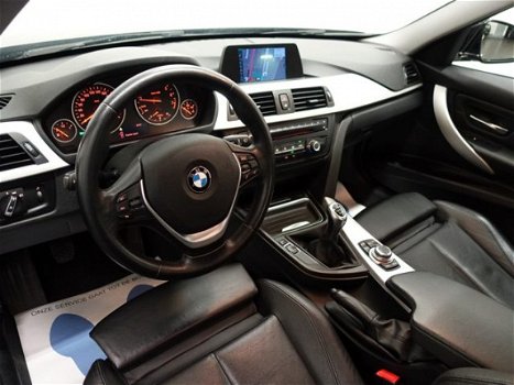 BMW 3-serie - 320i Sedan 170pk High Executive M Vol Leer, Navi, Xenon, PDC, ECC, LMV - 1