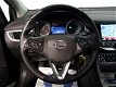 Opel Astra Sports Tourer - 1.0 Sport Edition, Schuif Kanteldak, Navi, ECC, Xenon Led - 1 - Thumbnail