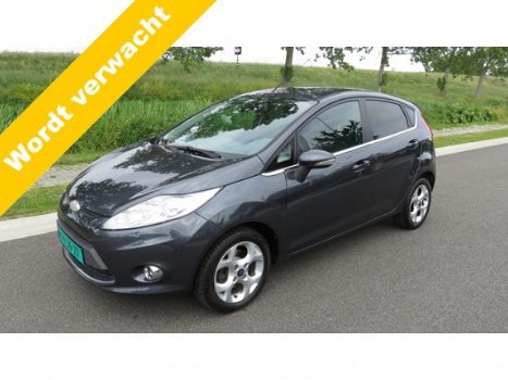 Ford Fiesta - 1.4i-16V Titanium 5 drs * Clima * 96.845 km * Bluetooth * Stoelverwarming - 1