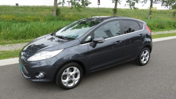 Ford Fiesta - 1.4i-16V Titanium 5 drs * Clima * 96.845 km * Bluetooth * Stoelverwarming - 1