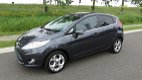 Ford Fiesta - 1.4i-16V Titanium 5 drs * Clima * 96.845 km * Bluetooth * Stoelverwarming - 1 - Thumbnail