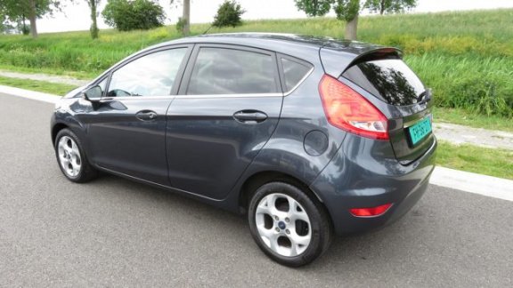 Ford Fiesta - 1.4i-16V Titanium 5 drs * Clima * 96.845 km * Bluetooth * Stoelverwarming - 1