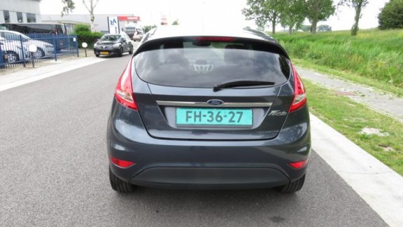 Ford Fiesta - 1.4i-16V Titanium 5 drs * Clima * 96.845 km * Bluetooth * Stoelverwarming - 1