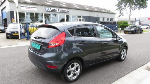 Ford Fiesta - 1.4i-16V Titanium 5 drs * Clima * 96.845 km * Bluetooth * Stoelverwarming - 1