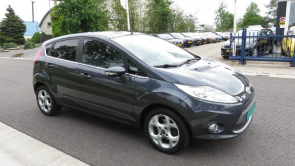 Ford Fiesta - 1.4i-16V Titanium 5 drs * Clima * 96.845 km * Bluetooth * Stoelverwarming - 1