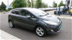 Ford Fiesta - 1.4i-16V Titanium 5 drs * Clima * 96.845 km * Bluetooth * Stoelverwarming - 1 - Thumbnail