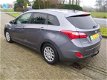 Hyundai i30 Wagon - 1.6 GDI i-Motion NAVI nw model - 1 - Thumbnail