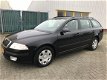 Skoda Octavia Combi - 1.6 Classic automaat - 1 - Thumbnail