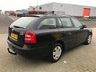 Skoda Octavia Combi - 1.6 Classic automaat - 1 - Thumbnail