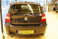 BMW 1-serie - 118i Executive AIRCO PARKEERHULP CRUISECONTR STOEL VERW - 1 - Thumbnail