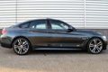 BMW 4-serie Gran Coupé - 440i Centennial High Executive Leder Sport interieur Schuifdak Head-up Lede - 1 - Thumbnail
