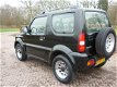 Suzuki Jimny - 1.3 JLX 4 wld. airco - 1 - Thumbnail