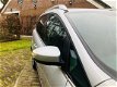 Ford Grand C-Max - 1.6 Titanium -NL auto-clima-lmv-pdc-trekhaak - 1 - Thumbnail